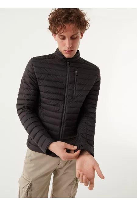 COLMAR GIACCA PIUMINO UOMO COLMAR. Leggero, caldo e resistente alle intemperie 2025