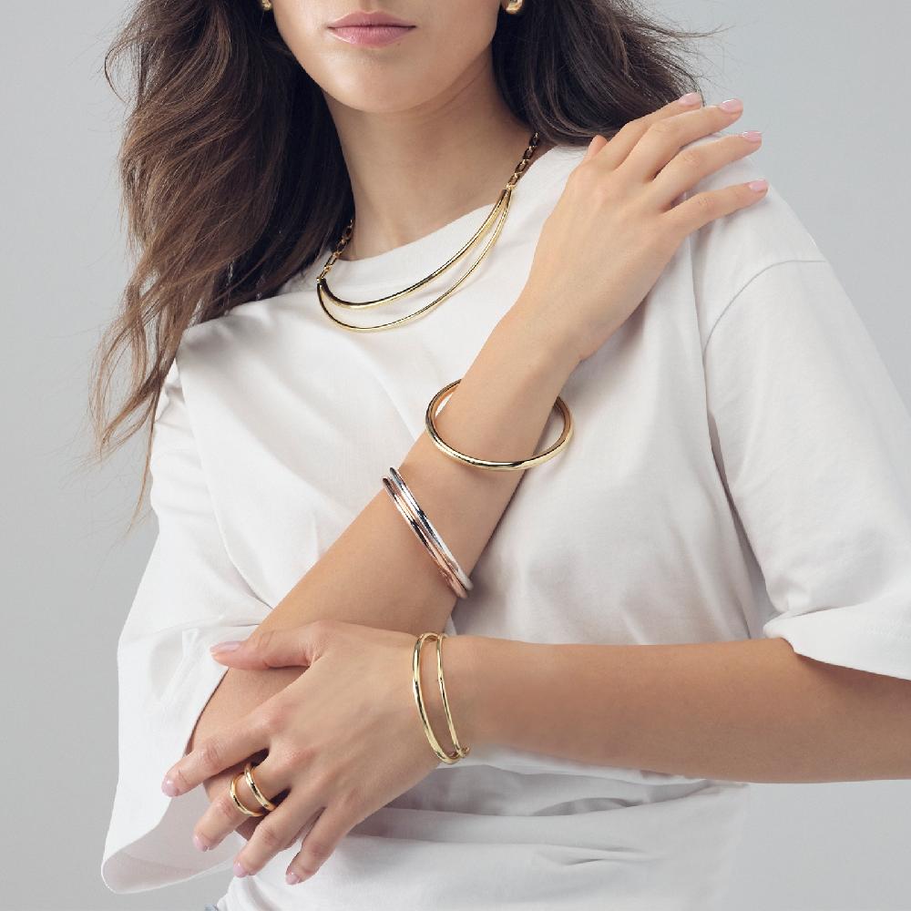 Unoaerre Bracciale bangle dorato | UNOAERRE Gioielli Presa