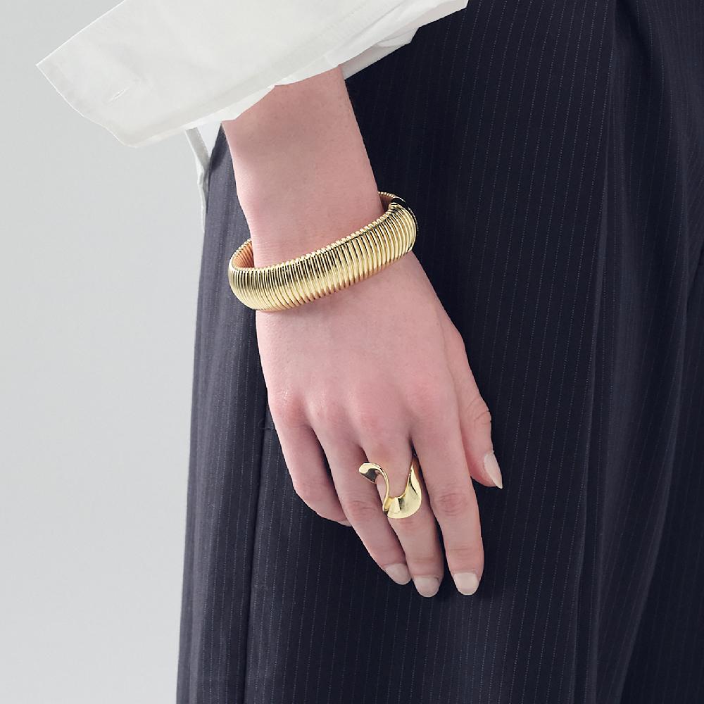 Unoaerre bracciale in bronzo dorato 493431 | UNOAERRE Gioielli Acquista Ora