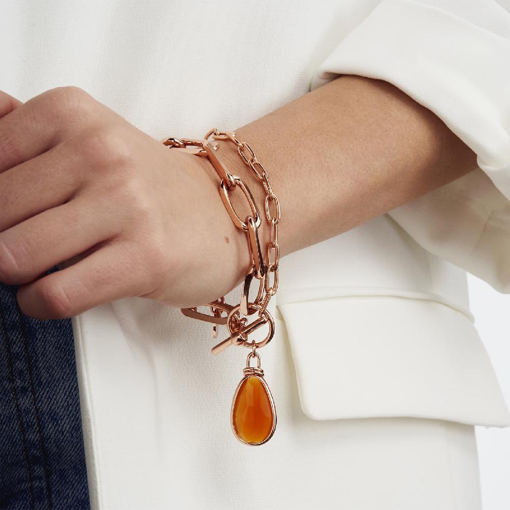 Unoaerre Bracciale in bronzo dorato rosa cristallo ambra | UNOAERRE Gioielli Ritorno libero