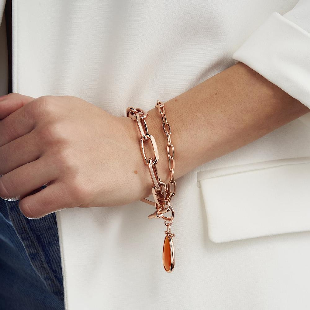 Unoaerre Bracciale in bronzo dorato rosa cristallo ambra | UNOAERRE Gioielli Ritorno libero