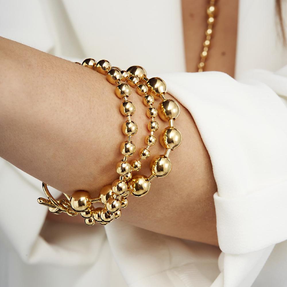 Unoaerre Bracciale in bronzo dorato Sphere | UNOAERRE Gioielli Ultimi tre giorni